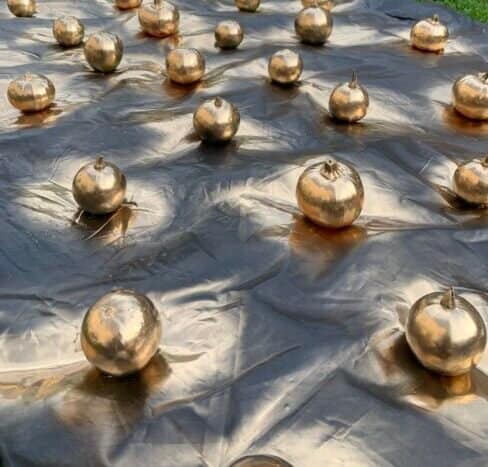 Gold Glamour: Transforming the Ordinary for a Party Gold Pumpkins